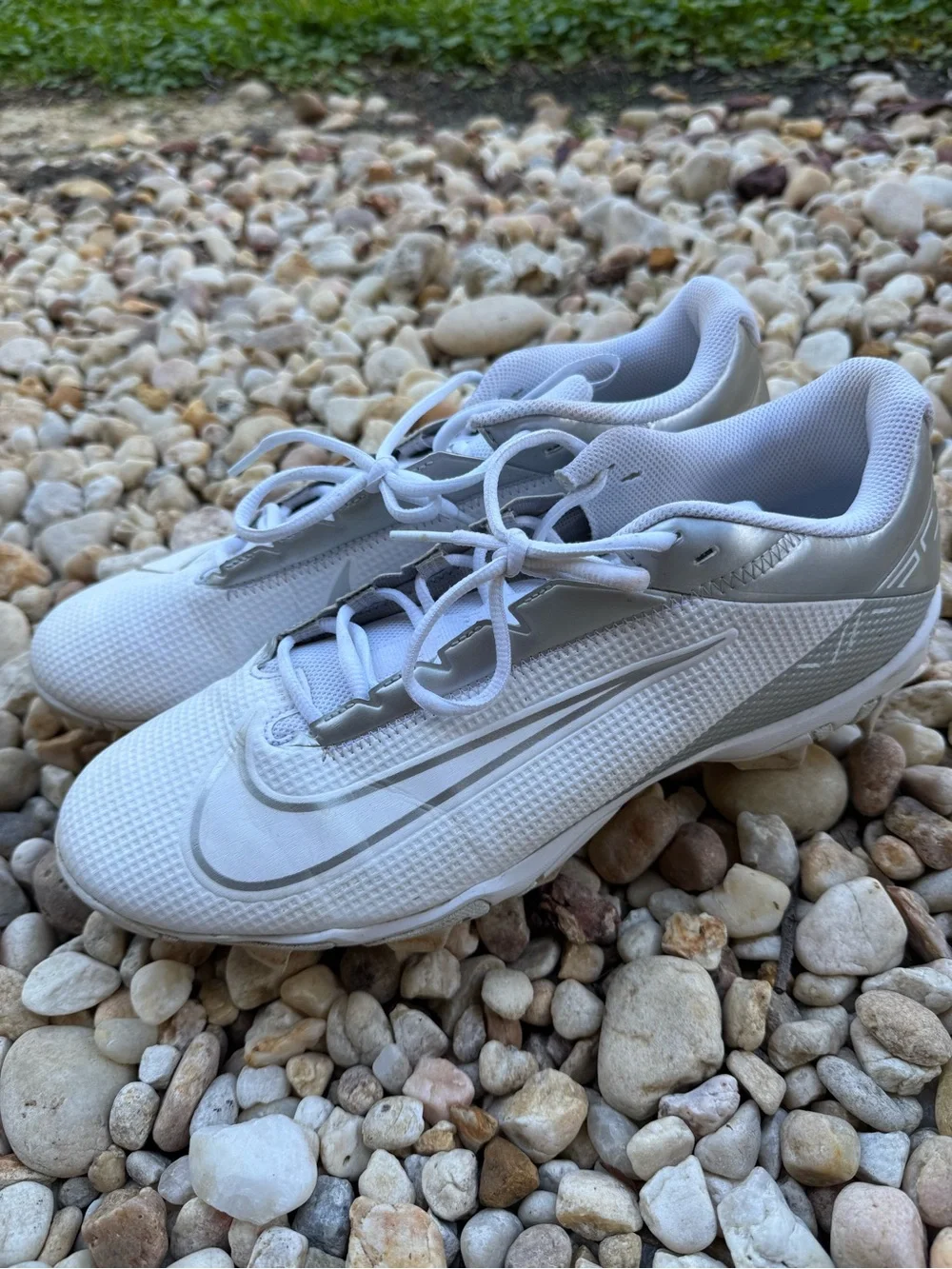 White Men's Nike Cleats with Silver Accents